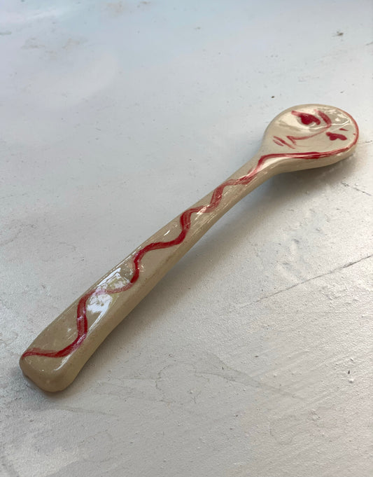 Red face spoon